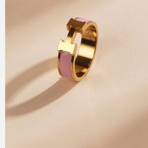 Hermes no!!!  Altar’d State Gold and Pink H stainless Steele ring.